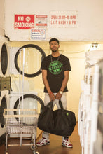 Load image into Gallery viewer, Omerta The Cleaner -  | Large Smell Proof odor eliminator storage Duffel Bag | Carbon filter technology  w/ a lock and key  | Anti theft durable duffel bag &amp; lockable storage protective bag with child proof locking zipper  | 811926022966
